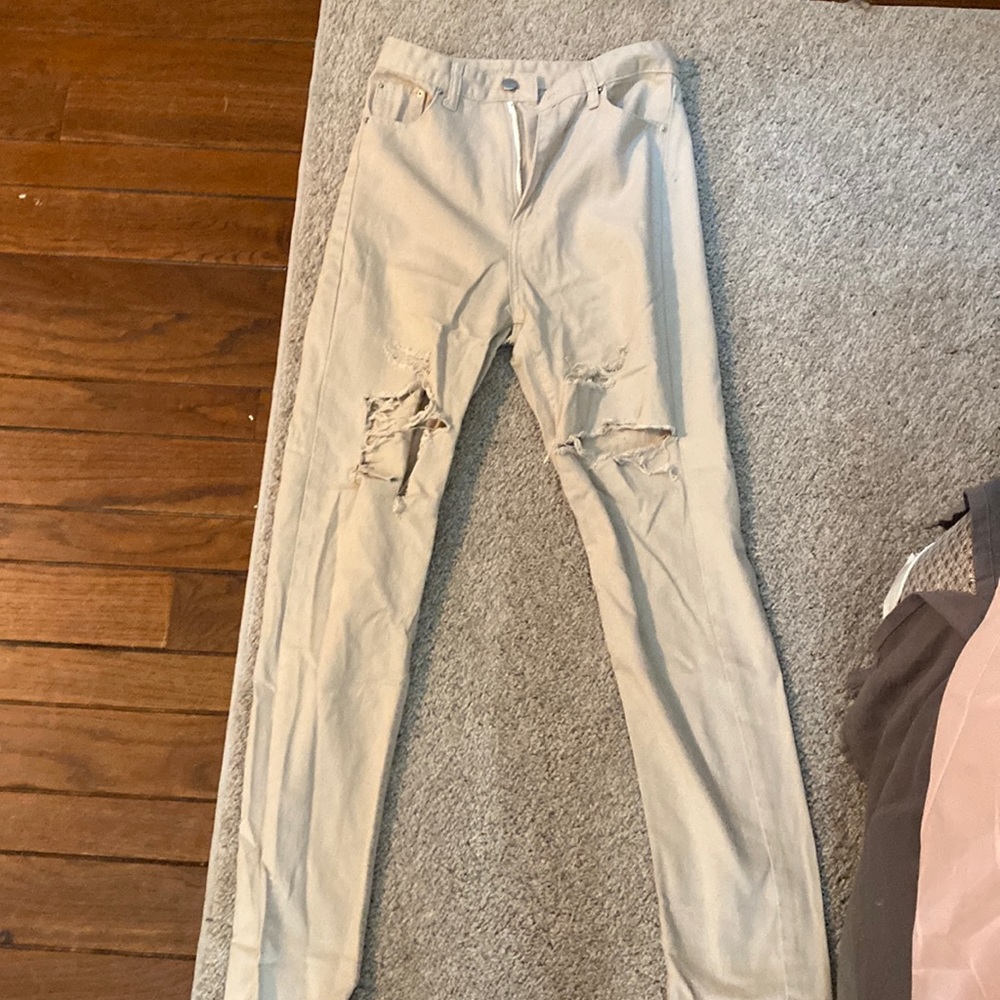 tan ripped jeans